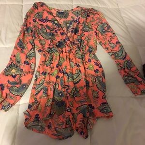 Peach color  romper. Purchased but Never worn